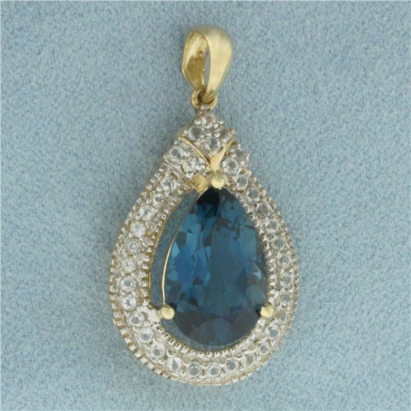 London Blue Topaz and Diamond Pendant in 10K Yellow Gold