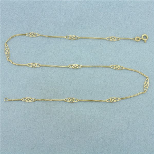 15 inch Curb Link Infinity Design Station Necklace in 14k Yellow Gold