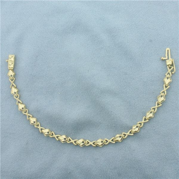 Diamond Cut Designer Hugs and Kisses Link Bracelet in 14k Yellow Gold