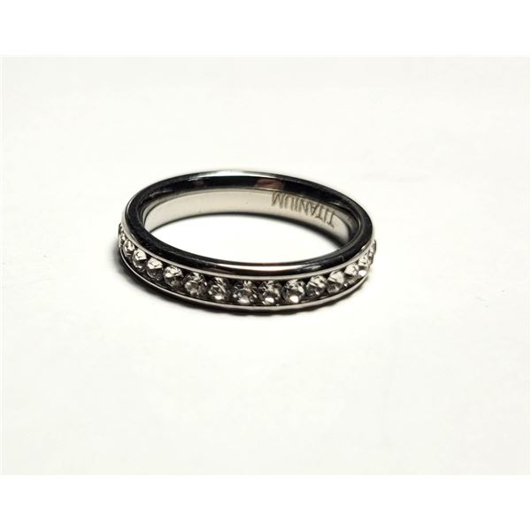 3) TITANIUM SIZE 7 ETERNITY RING.