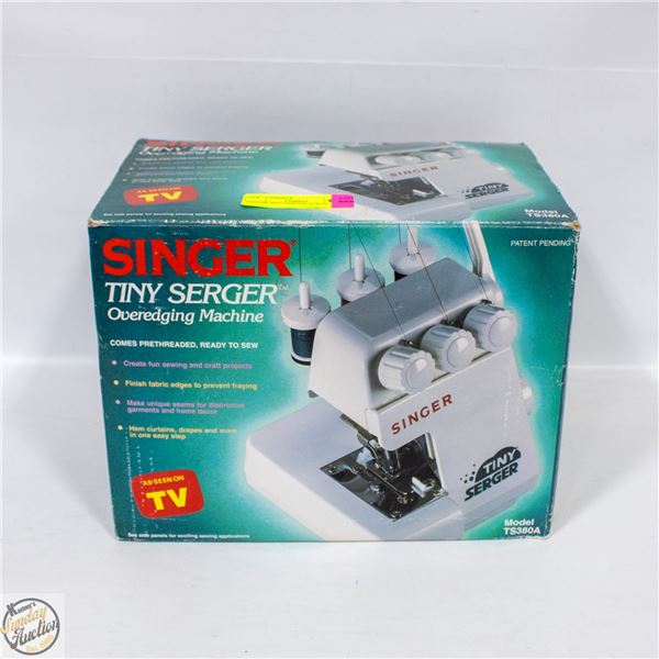 SINGER TINY SERGER IN BOX