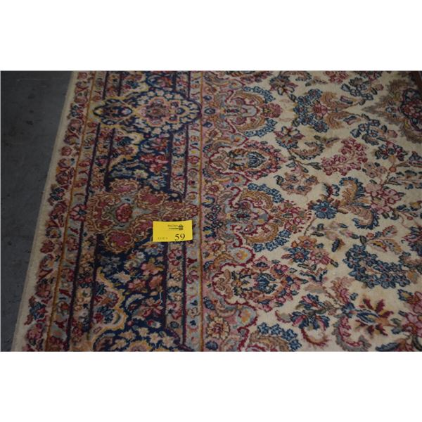 KARASTAN KIRMAN WOOL RUG (DAMAGE TO CENTER) (104" X 144")