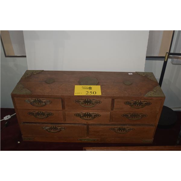8 DRAWER WOOD CABINET W/BRASS EMBELLISHMENTS (25" X 11" X 8 1/2")