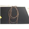 Image 2 : SINGLE STRAND NECKLACE, FEATURES THIN, DISK SHAPED NEISHI BEADS CRAFTED FROM NATURAL COCONUT SHELLS 