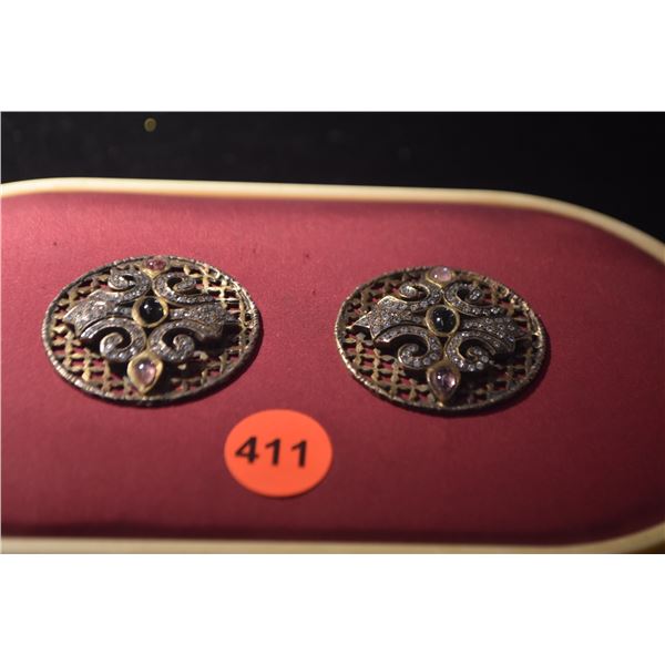 PAIR OF BEJEWELED SILVER DISCS (PAIR)