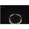 Image 2 : 14K CARVED GREEN JADE BRACELET (22.1 GTW)