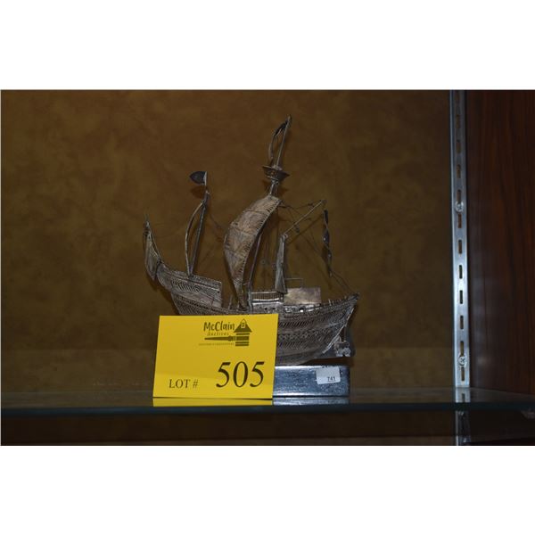 SILVER JUNK ON STAND