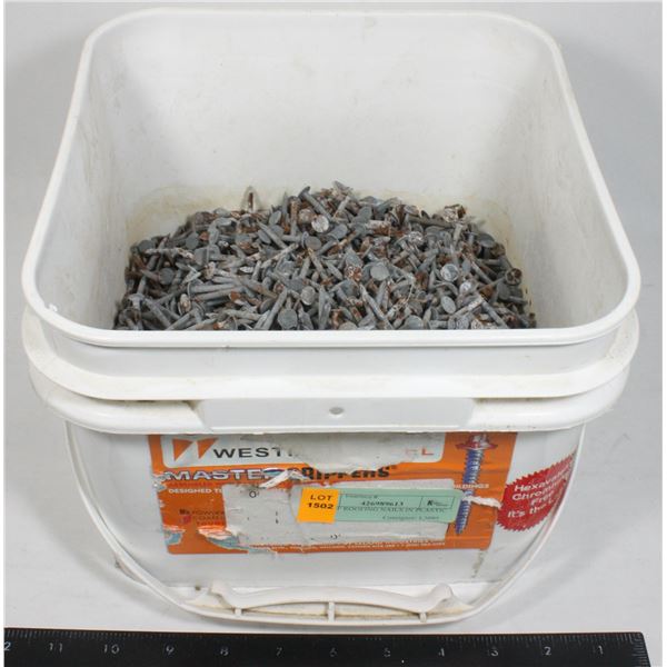 LOT OF NAILS IN PLASTIC TUB