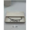 Image 1 : A Guess Silver Tone Charm Bracelet in Original Box