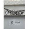 Image 2 : A Guess Silver Tone Charm Bracelet in Original Box