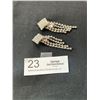 Image 1 : Pair of Vintage Clipon Silvertone Diamond Shape Rhinestone Dangle Earrings