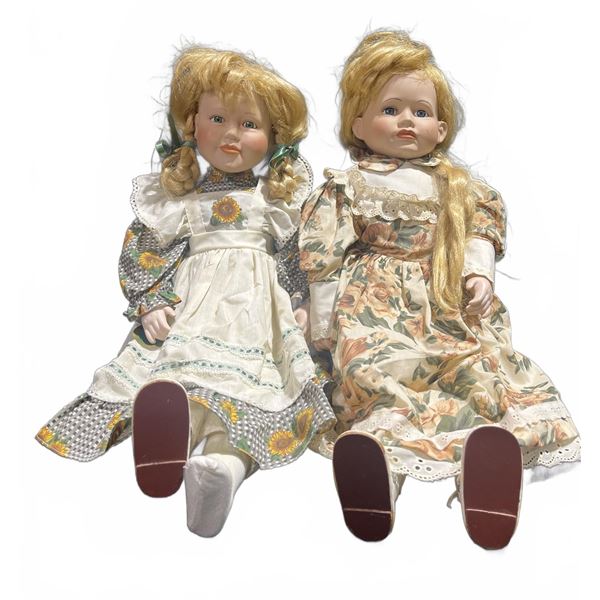 Porcelain Dolls in Floral Dresses with Blonde Hair and Painted Faces