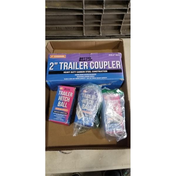 TRAY OF BETTER BOAT ITEMS INCLUDING 2" TRAILER COUPLER AND 3 TRAILER HITCH BALLS