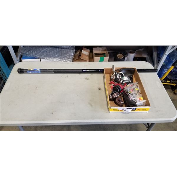 TRAY OF FISHING REELS, TACKLE, AND EXTRA LONG FISHING ROD