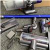 Image 3 : DYSON V10 CORDLESS STICK VACUUM WITH ACCESSORIES AND CHARGER WORKING