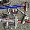 Image 5 : DYSON V10 CORDLESS STICK VACUUM WITH ACCESSORIES AND CHARGER WORKING