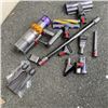 Image 1 : DYSON V15 CORDLESS STICK VACUUM WITH ACCESSORIES AND CHARGER WORKING