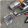 Image 2 : DYSON V15 CORDLESS STICK VACUUM WITH ACCESSORIES AND CHARGER WORKING