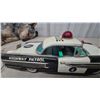 Image 5 : HTC Japan 1961 Oldsmobile Highway Patrol Radio-Controlled Battery-Operated Tin Toy Car, 12”