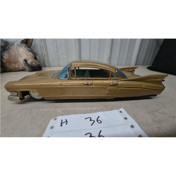 Vintage Japanese Tinplate 1959 Cadillac Sedan Toy Car in Gold With Tail Fins, 11”