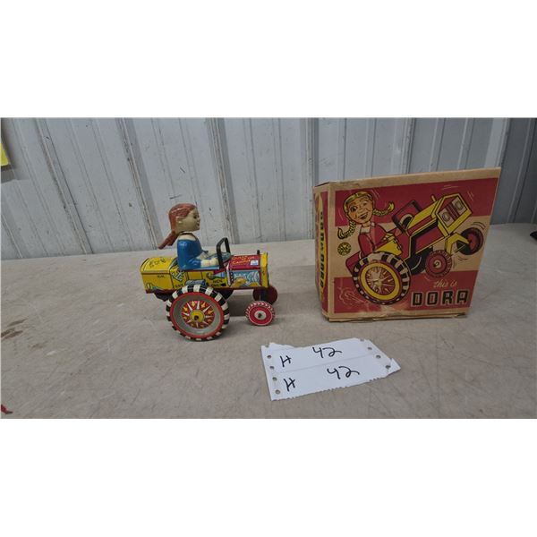 Louis Marx "Dora the Girl Driver" Tin Litho Wind-Up Tractor with Original Box, Early 1950s