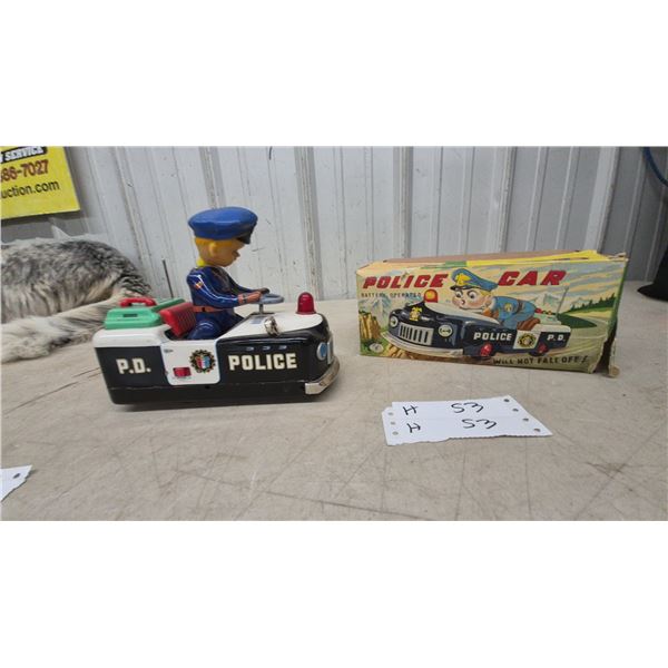 Marusan Battery-Operated Tin Police Car with Plastic-Head Driver, Model 6167, with Box, 9”
