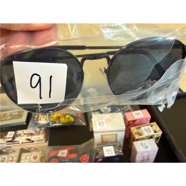 PAIR OF SUNGLASSES