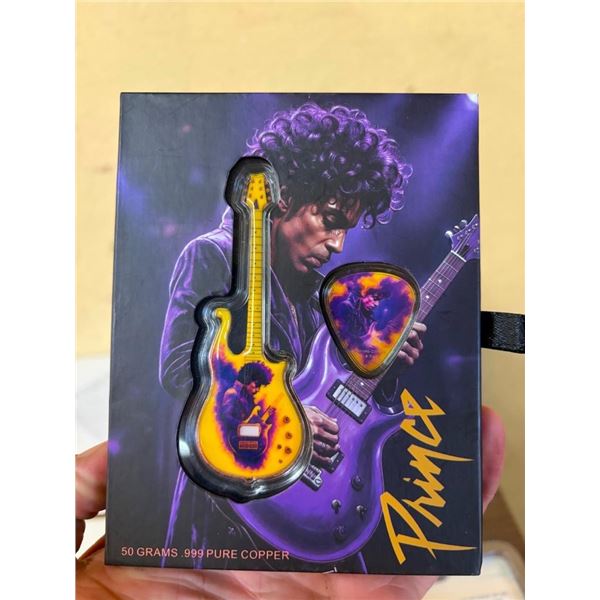 COLLECTIBLE PRINCE PICK AND FIGURINE GUITAR