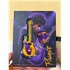 Image 1 : COLLECTIBLE PRINCE PICK AND FIGURINE GUITAR