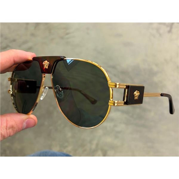 PAIR OF SUNGLASSES