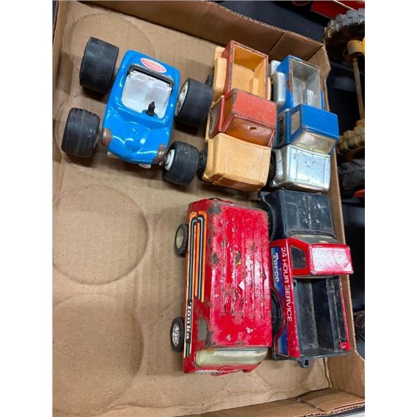 4 TONKA TRUCKS AND 1 OTHER VEHICLE
