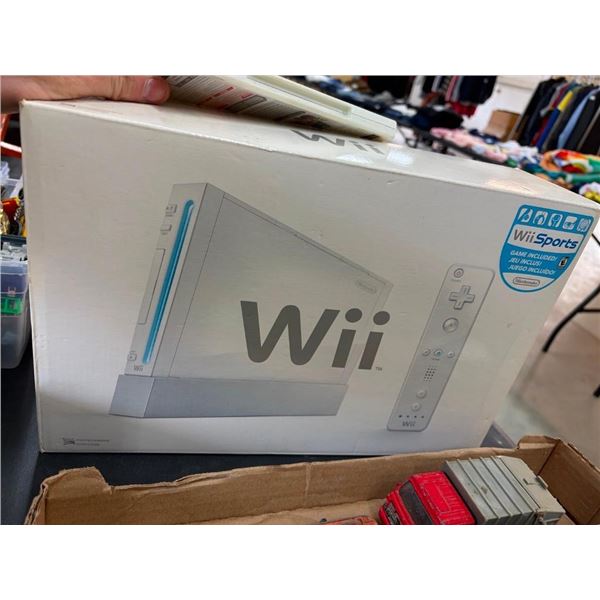WII GAMING STATION WITH REMOTE AND CORDS AND MARIO CART GAME