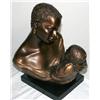 Sculpture Of A Lady Holding Her Baby