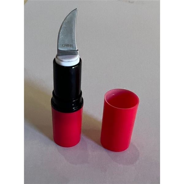 Lipstick case pocket knife prop