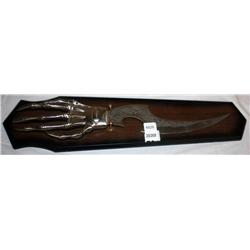 Hand Design Knife on a Plaque