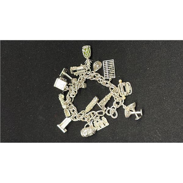 SILVER CHARM BRACELET WITH MULTIPLE SILVER CHARMS (67.2G)