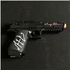 Image 1 : MEL GIBSON AND DANNY GLOVER DUAL SIGNED PROP GUN - WWOC COA