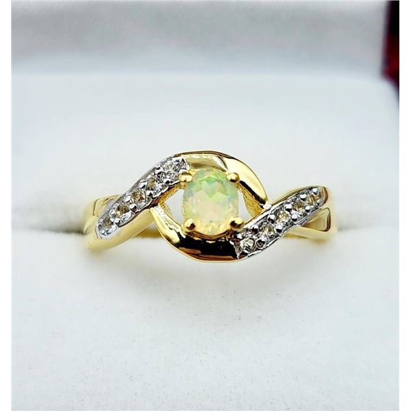 Gold Plated Sterling Silver Natural Opal with White Sapphire Ring, Size 7, W/A $750.00. Opal is the 