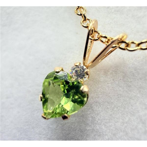 10KT Yellow Gold Natural Peridot Heart Shape Pendant with Brass Gold Plated Chain, Retail $400.00.