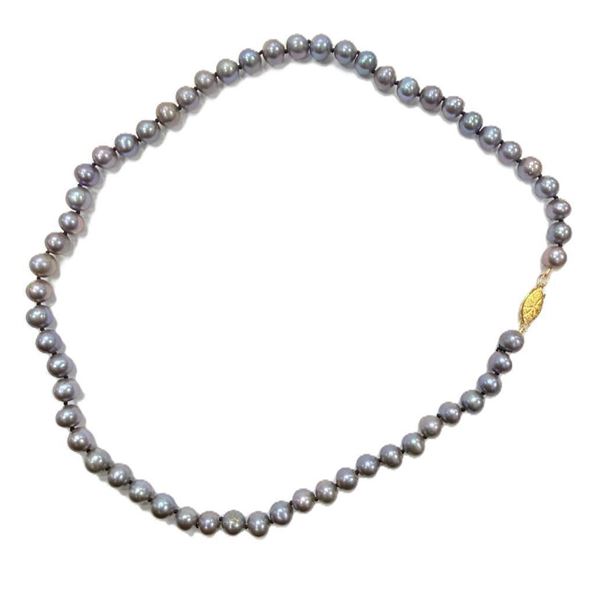 Cultured Pearl with Sterling Silver Claps Necklace, Retail $450.00.