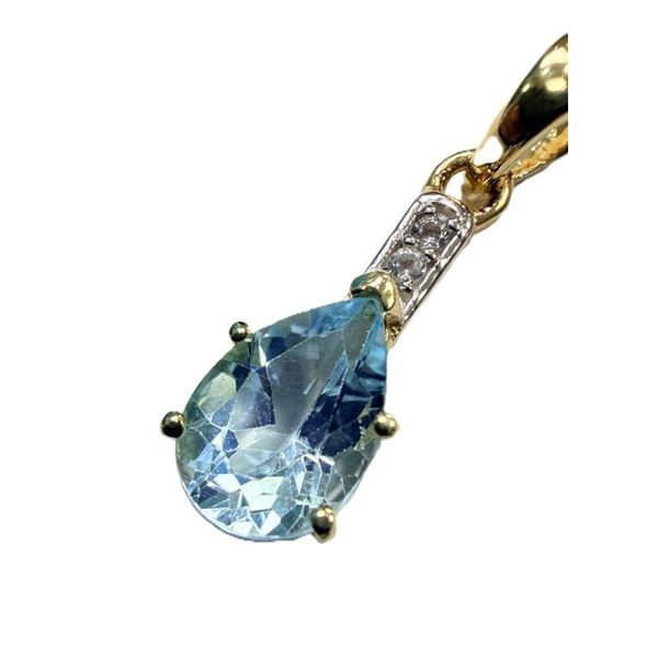 Gold Plated Sterling Silver Natural Blue Topaz and CZ with Brass Gold Plated Chain, Retail $550.00. 