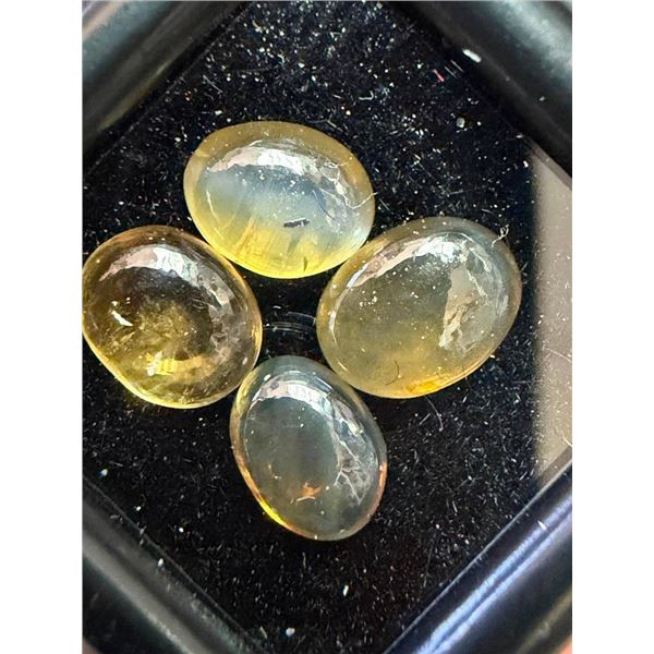 $100, natural cats eye (3ct), retail value $100