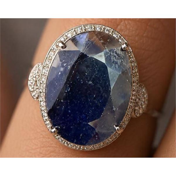 $350, silver.(5.68g), sapphire (5ct)ring, size , retail value $350, ring resizeable for $50