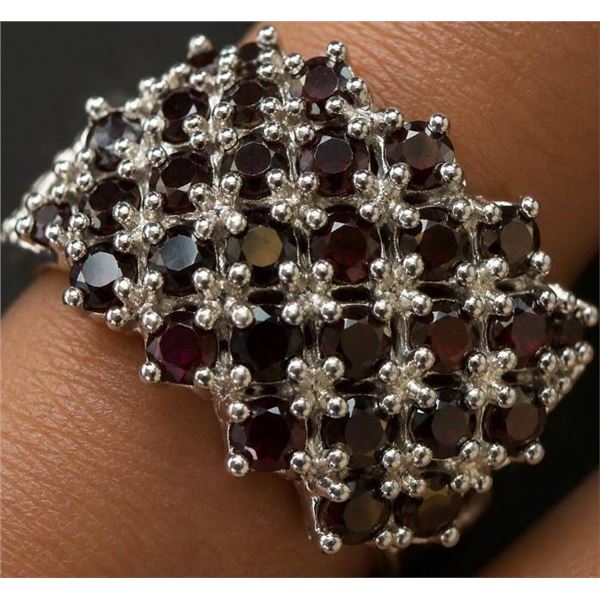 $400, silver.(9g), garnet (2.8ct)ring, size , retail value $400, ring resizeable for $50