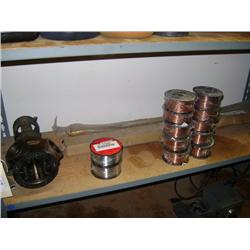 CONTENTS OF SHELF--GEAR DRIVE AND WELDING WIRE
