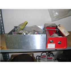 CONTENTS OF SHELF--ROCK TUMBLER AND BOLTS AND PARTS