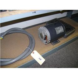 CONTENTS OF SHELF--3/4HP ELECTRIC MOTOR AND SOLDERING IRON