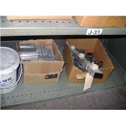 CONTENTS OF SHELF--SEALANT, BRACKETS AND BOLTS