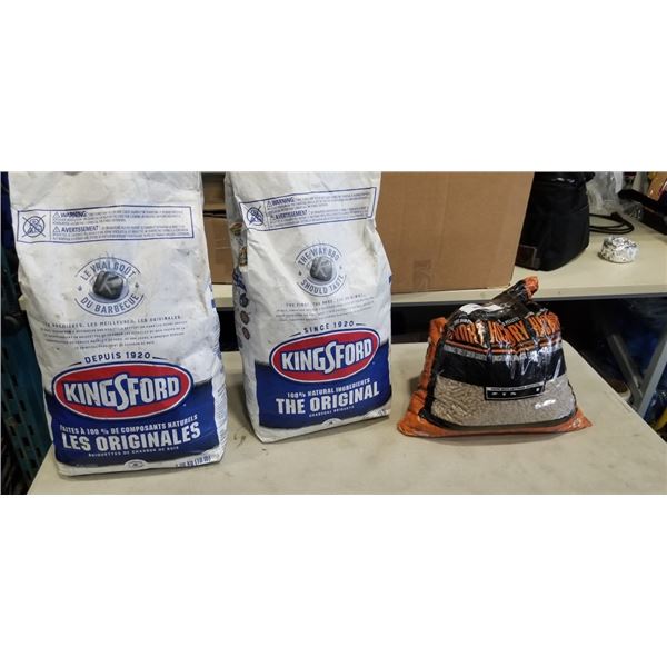 2 BAGS OF KINGSFORD CHARCOAL BRIQUETS AND PARTIAL BAG OF HICKORY PELLETS