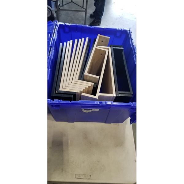 BLUE TOTE FULL OF DESK RISERS AND DESK SHELVES